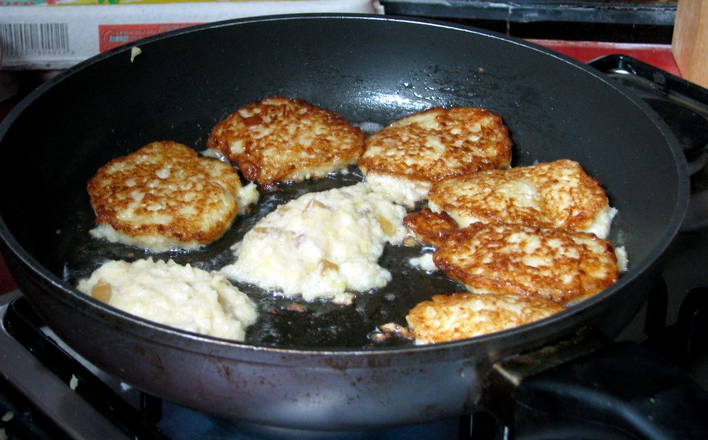 Potato Latkes Frying in Oil