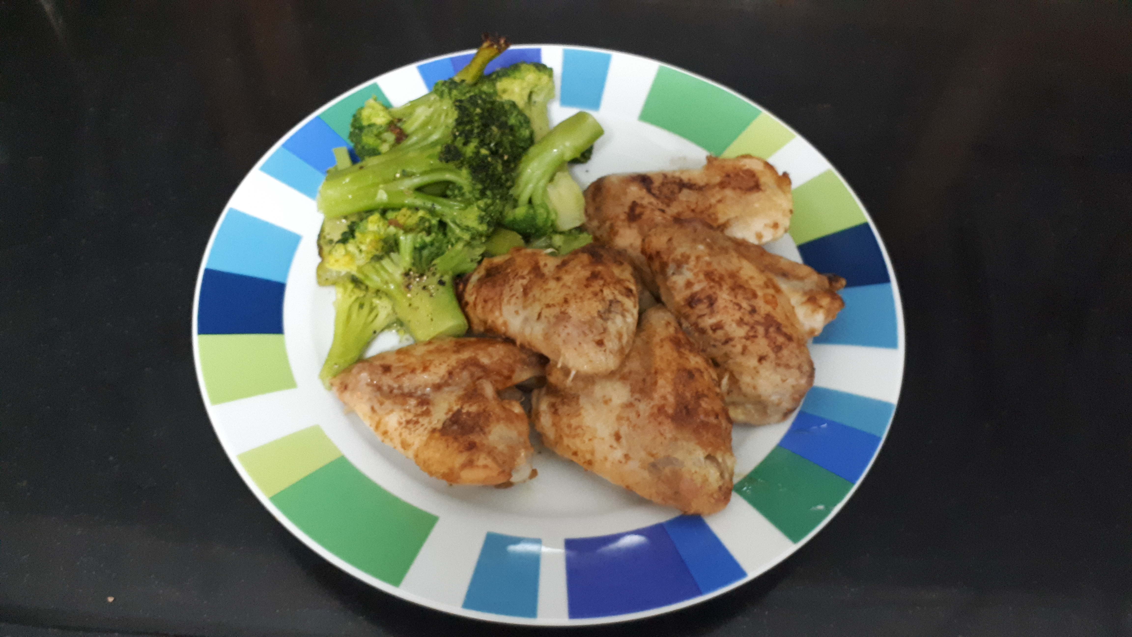 Chicken wing and broccoli dinner